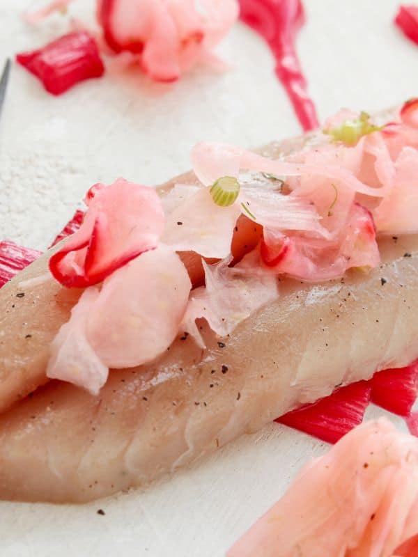 closeup of cured mackerel recipe served with pickled onion