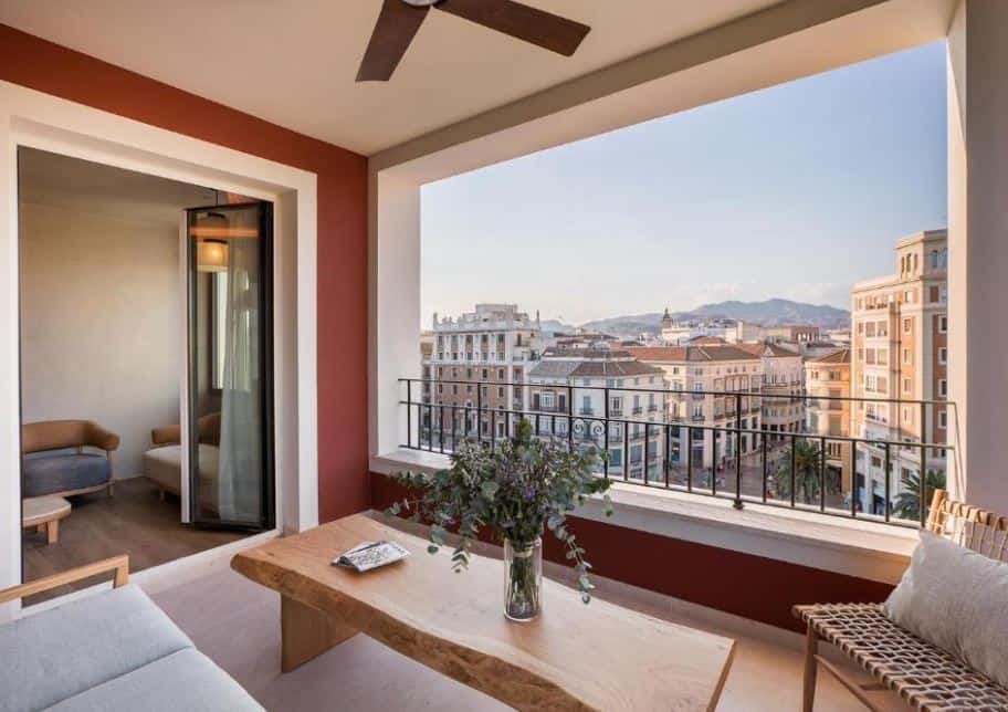 room with bedroom and living room with city views at Only YOU Hotel Malaga, one of the top hotels in Malaga