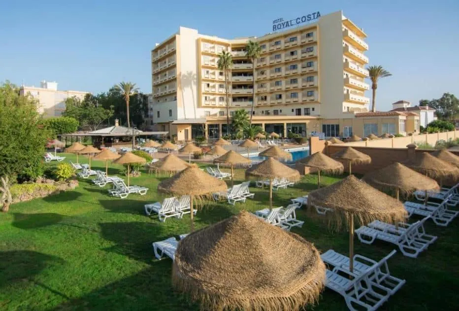 the Hotel Costa seen from the garden with pool and sun lounges, one of the best hotels near Malaga Airport