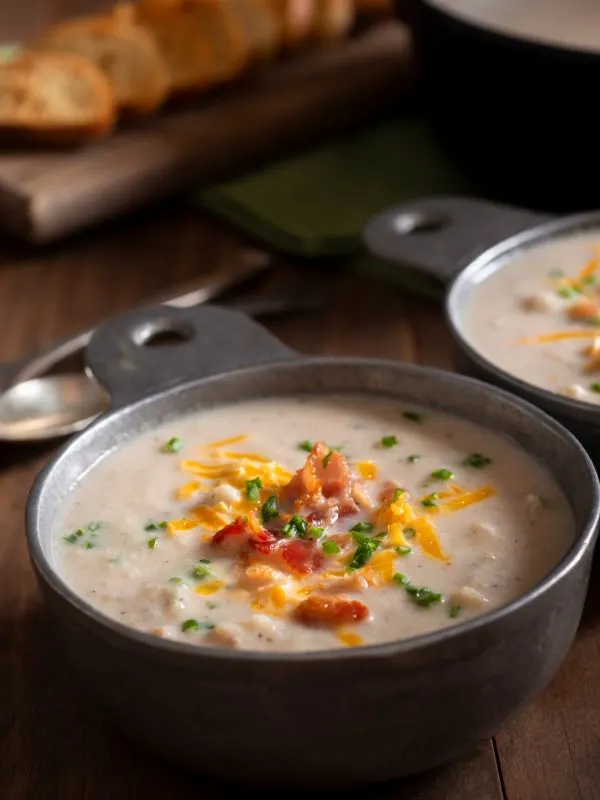 a bowl of ham and cauliflower soup from Spain served with toast.