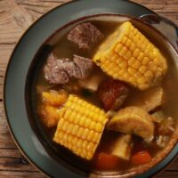 mexican oxtail soup with corn kernel and vegetables