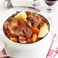 braised oxtail recipe served with red wine