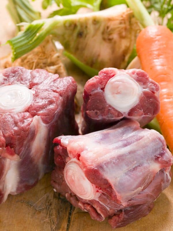 oxtails, carrots and celery for the oxtail stew with vegetables 
