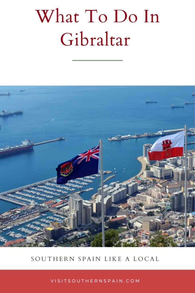a pin with 2 flags of Gibraltar and the sea in distance, what to do in Gibraltar