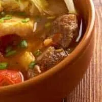 old-fashioned oxtail soup recipe in a clay bowl
