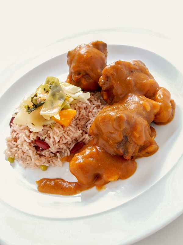 oxtails and rice on a plate