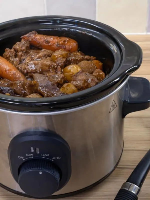 slow cooker oxtail with carrots ready to be served