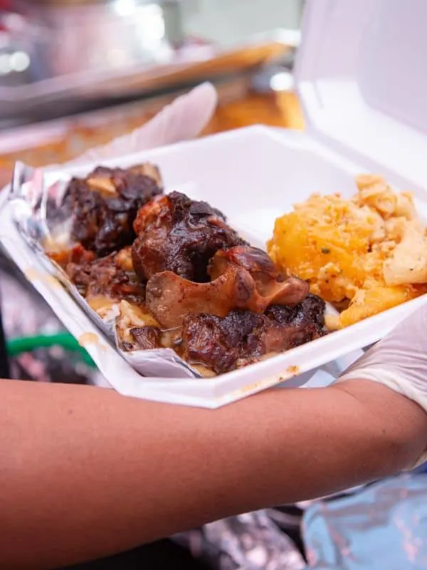 braised oxtails in oven in a to go box