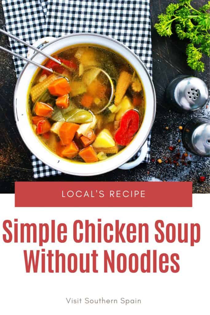 a pin with a colorful chicken soup without noodles in a bowl.