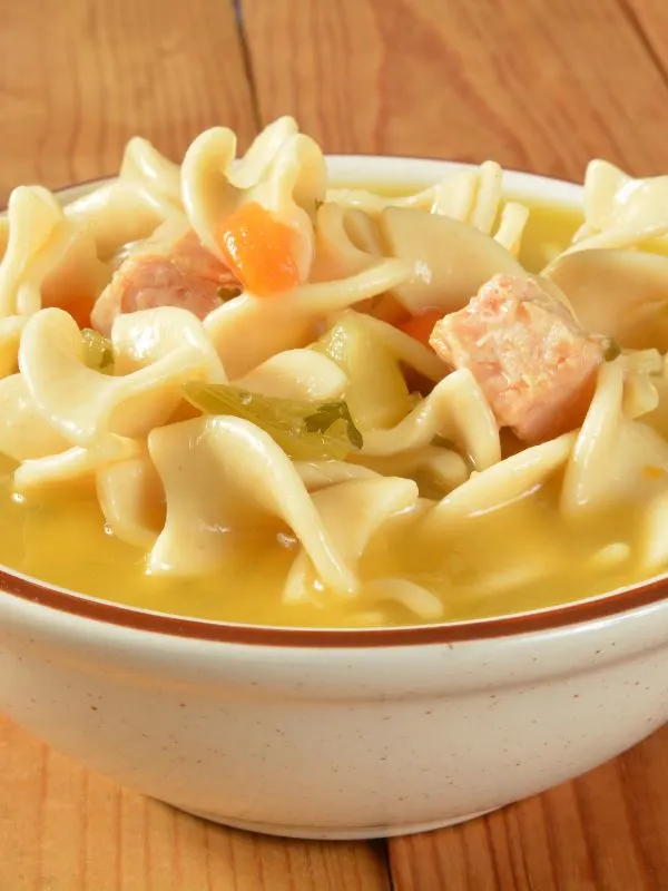 a bowl of fish noodle soup