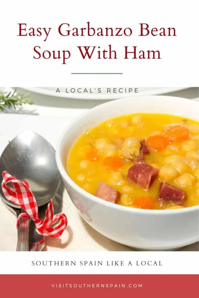 a pin with a garbanzo bean soup with ham in a bowl.
