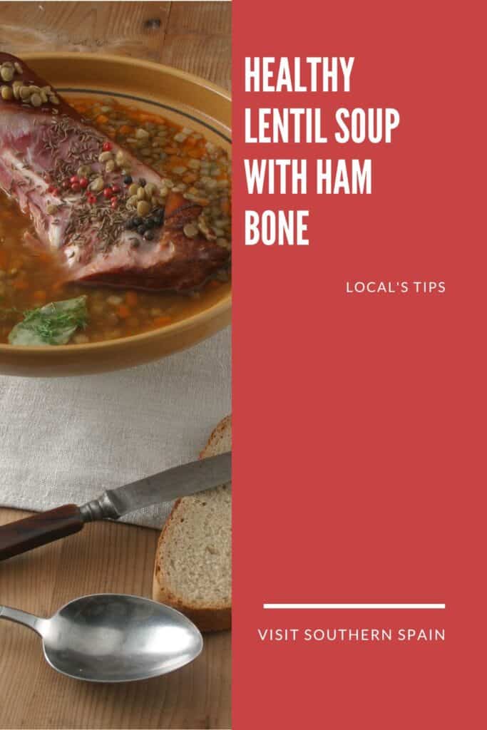 a pin with lentil soup with ham bone in a bowl