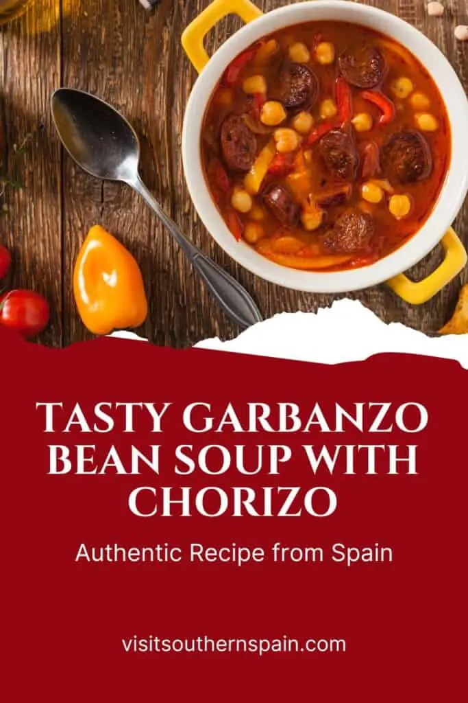 a pin with a garbanzo bean soup with chorizo in a yellow pot.