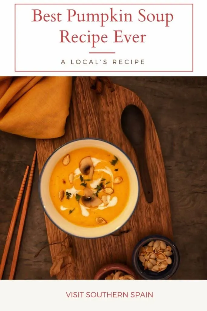 a pin with the Best Pumpkin Soup Recipe Ever on a wooden board.