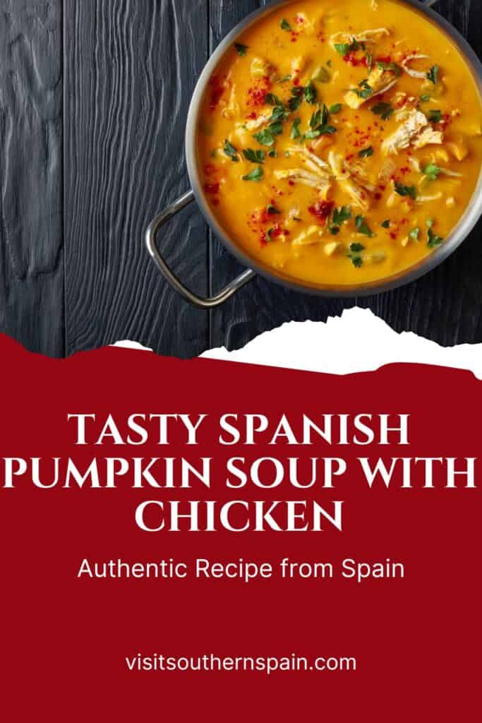 a pin with a pot of Spanish Pumpkin Soup With Chicken on a wooden surface.