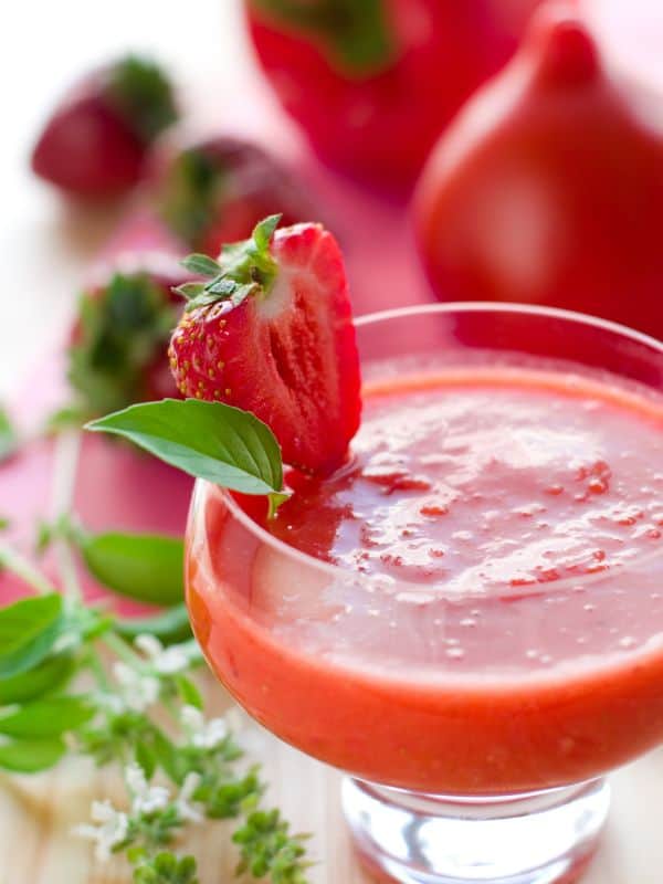 summer fruit soup decorated with a strawberry