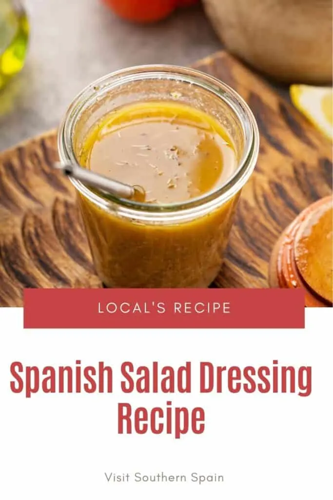 a pin with a Spanish Salad Dressing in a jar on a wooden surface