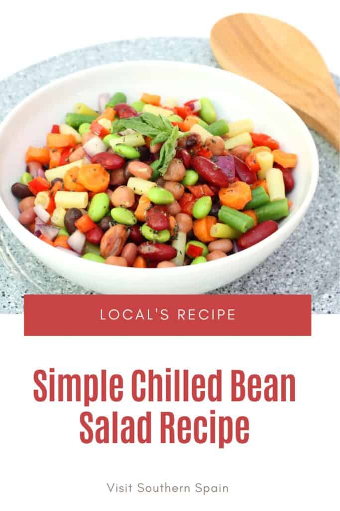 a pin with a Chilled Bean Salad served in a bowl,