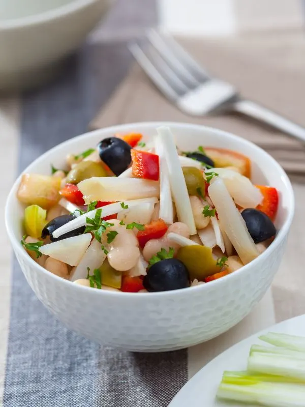 Spanish White Bean Salad in a white bowl