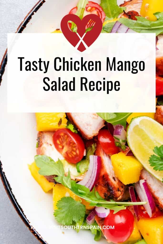 a pin with Chicken Mango Salad on a plate.