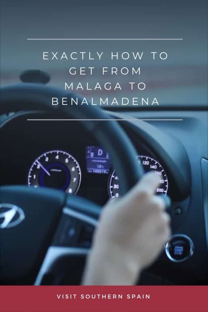 a closeup view of a hand on a steering wheel driving