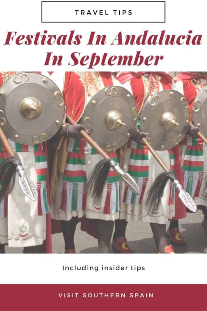 a group of people dressed in red and green holding shields