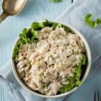 keto chicken salad recipe in a bowl on a blue table