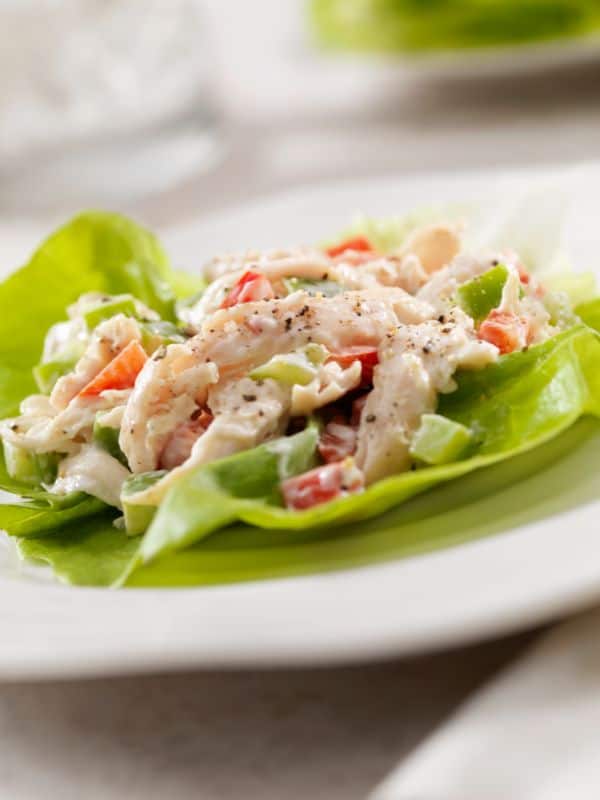 chicken salad recipe with yogurt served on a lettuce leaf