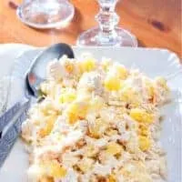 pineapple chicken salad on a plate on a wooden table