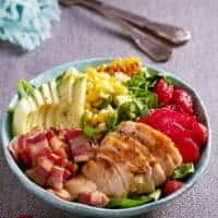 summer salad with chicken in a bowl