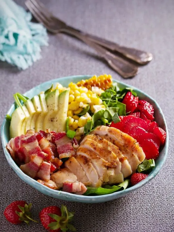 summer salad with chicken in a bowl