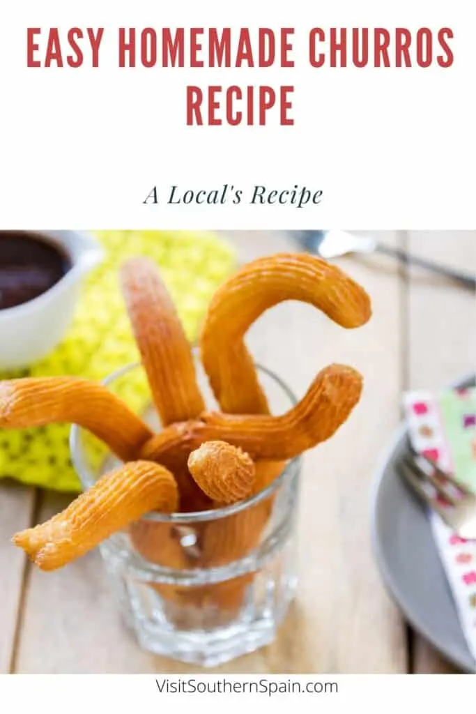 a pin with Homemade Churros in a glass on a table