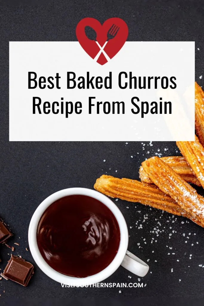 a pin with Baked Churros on a black surface with a cup of chocolate sauce next to it.