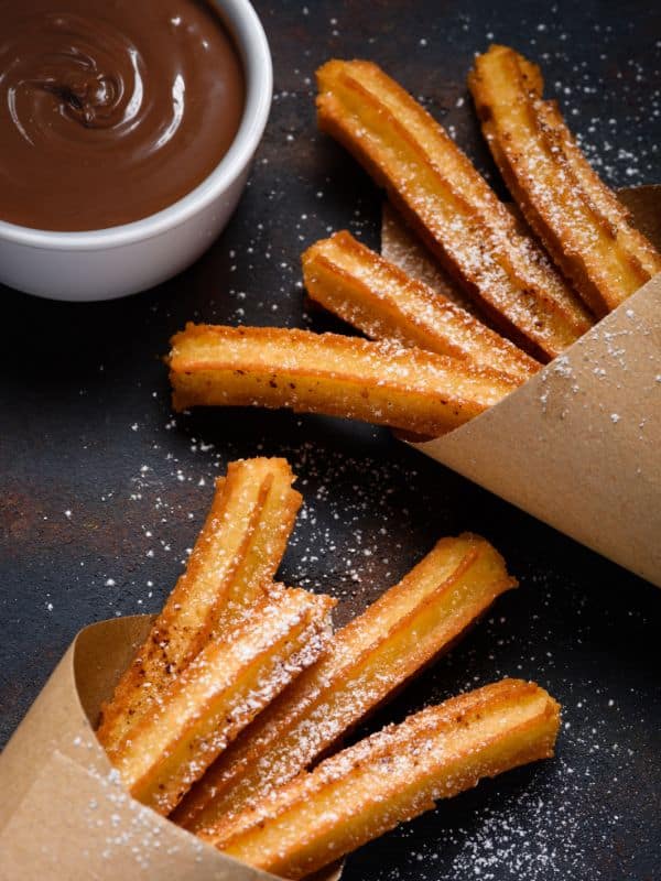 Homemade Churros in 2 packets served with chocolate sauce