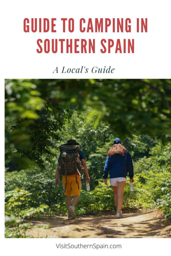a pin with a couple hiking in a forest. camping in southern Spain