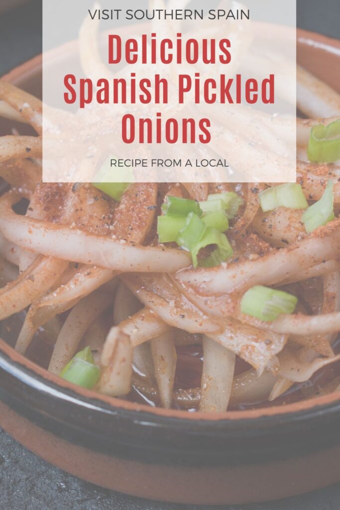 a pin with a closeup of spanish pickled onions