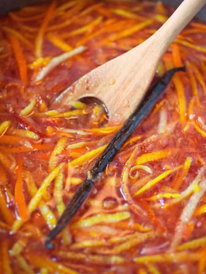 closeup of Seville orange marmalade and a vanilla bean