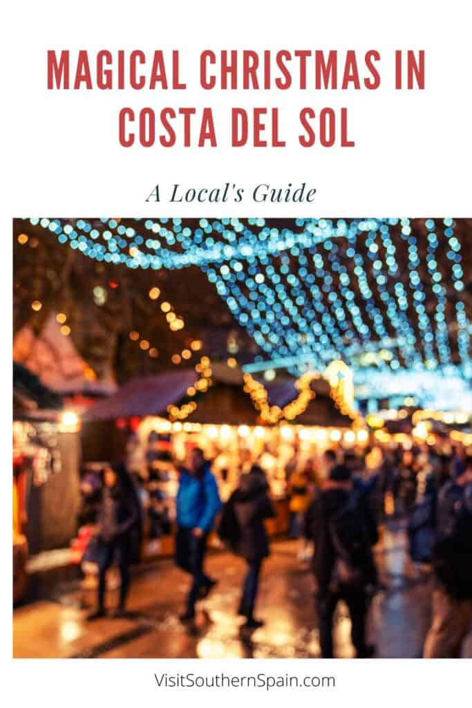 a pin with christmas lights and people walking at christmas in costa del sol