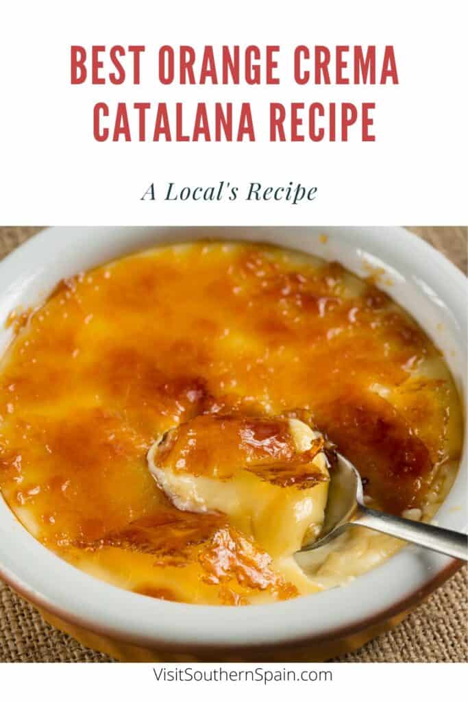 a pin with a spoon in a bowl of Orange Crema Catalana