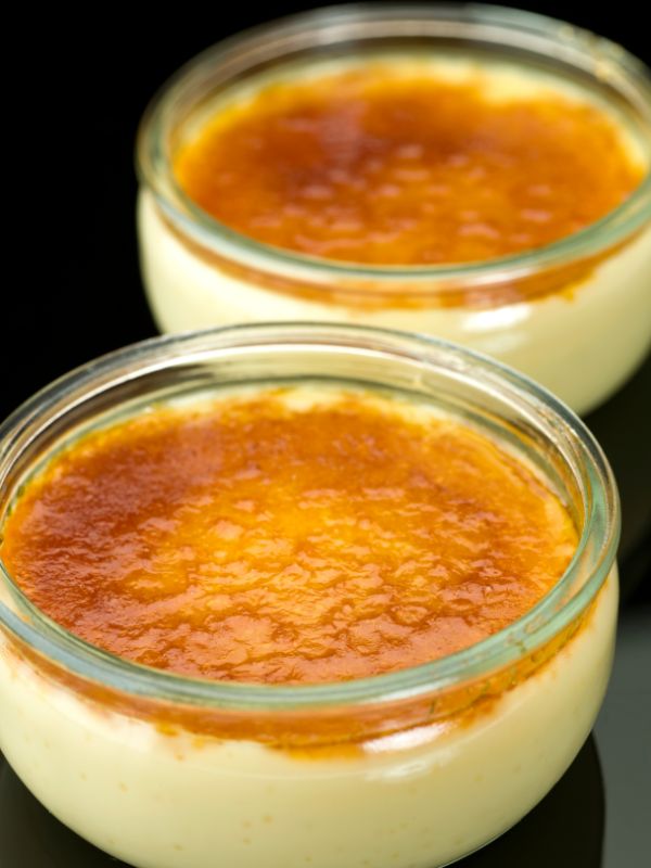 orange crema catalana in 2 glass cups
