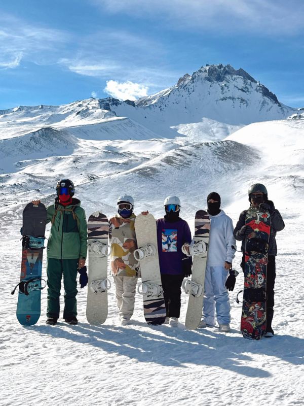 a group of people snowboarding in Granada, Things to do in Sierra Nevada Ski Resort
