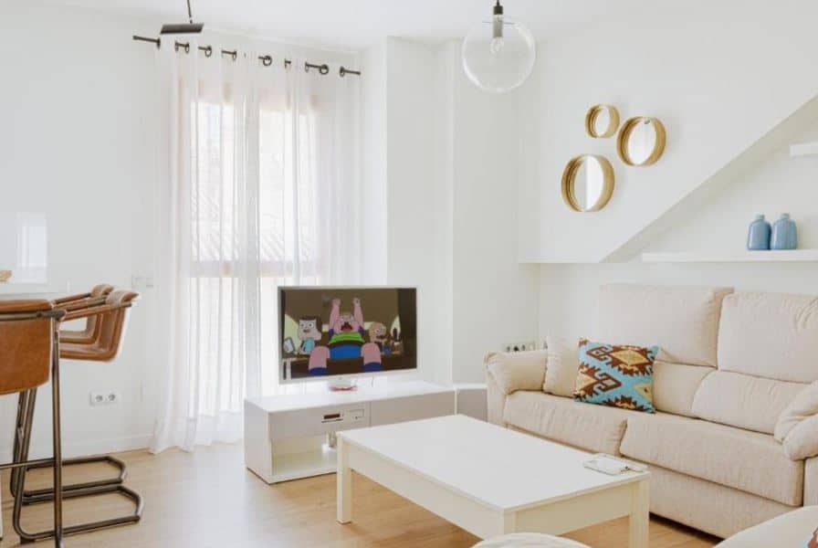 living room at Caleta Homes - Apartamentos Pompidou, family hotels in malaga