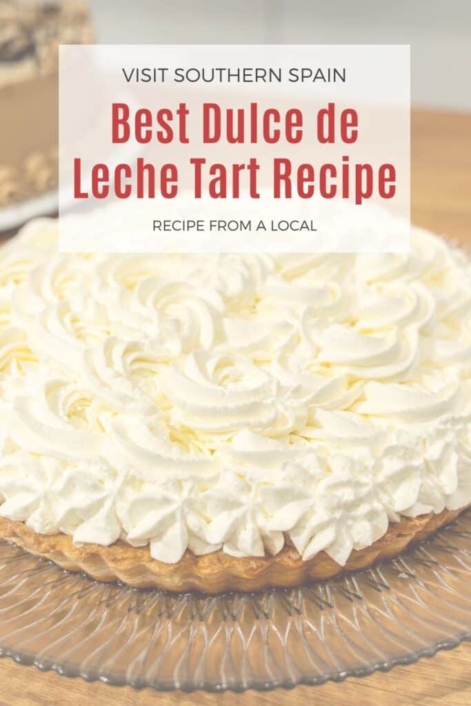 a pin with a Dulce de leche tart decorated with whipped cream
