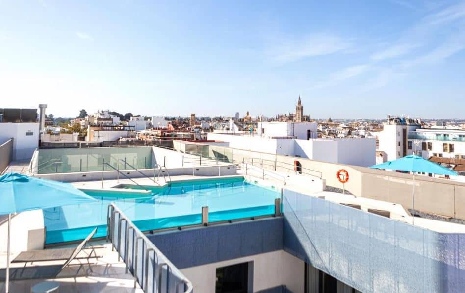 rooftop pool and view at Hotel Maci&agrave; Sevilla Kubb